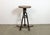 Vintage Industrial factory stool made in former Czechoslovakia during the 1960s It features a plywood seat and a brown...