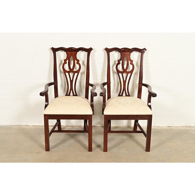 A gorgeous pair of Georgian or Chippendale style armchairs or dining captain chairs By Thomasville USA, Late 20th Century...