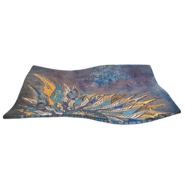 Sole d'Oriente is a unique Raku ceramic work, shaped and decorated entirely by hand without a wheel or molds. Dynamic...