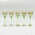 A striking set of 8 vintage wine goblets crafted from hand-blown green glass, each stem delicately tapered and slightly...