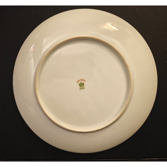 Add a touch of serene, early 20th century elegance to your collection with this exquisite, hand-painted porcelain cabinet...