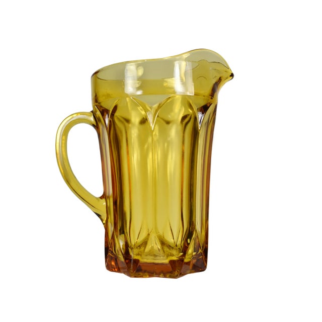Stunning set of amber glass with Whitehall design by Indiana Glass Company and a Fairfield hocking pitcher. This set is an...