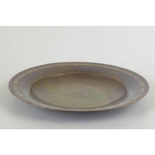 Just andersen dish in alloyed bronze (lb 512), c. 1940s. Large round art deco dish with a wide rim decorated with...