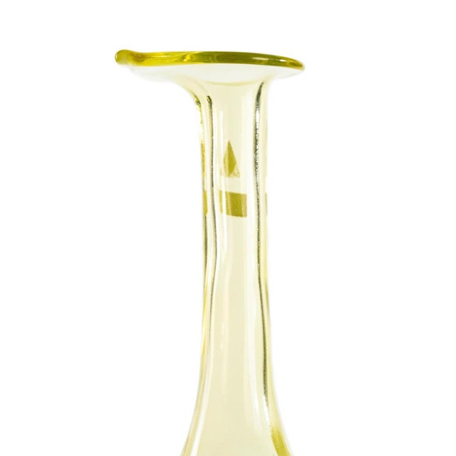 This crystal vase is a tall beautiful vase with a bulbous body and a long neck terminated with a lily-shaped mouth. The...
