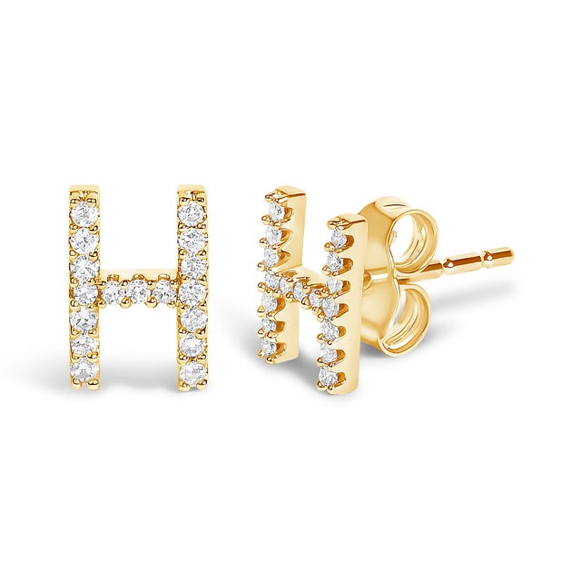 Expertly crafted to symbolize individuality and grace, this exquisite "H" initial stud earring is fashioned from radiant...