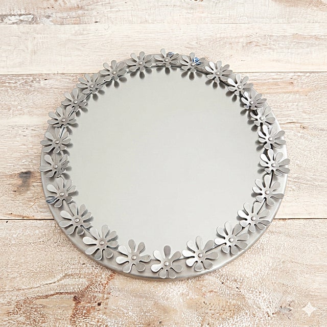Vintage Mirror with Metal Flowers, Sweden, 1970s, in Very Good conditions. Designed 1970 to 1979 This piece has an...