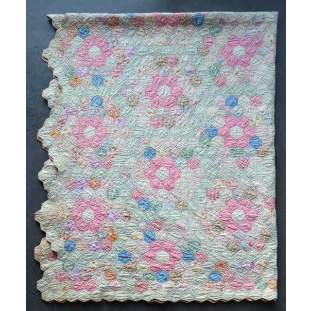This beautiful summer-weight quilt in soft colors was lovingly hand-stitched with cotton feed-sack prints on the front and...