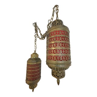 1900's Middle Eastern Hammered & Pierced Brass Swag Electrified Lanterns With Red Liner- A Pair For Sale