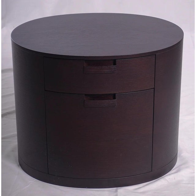 B&B Italia Maxalto Amphora Night Table brings refined Italian craftsmanship and sculptural simplicity to modern interiors....