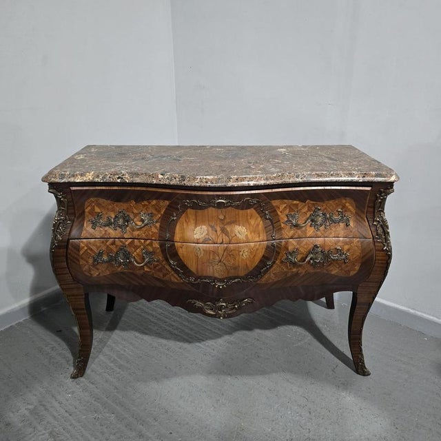 Very good French marquetry two drawer commode chest of drawers on the large size, ormolu handles and mounts, and a...