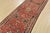 An authentic semi-antique, traditional Malayer runner hand-knotted with fine wool and natural dyes. This oriental rug...