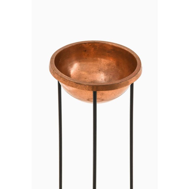 This freestanding ashtray, designed by hans-agne jakobsson and produced by his company hans-agne jakobsson ab in markaryd,...