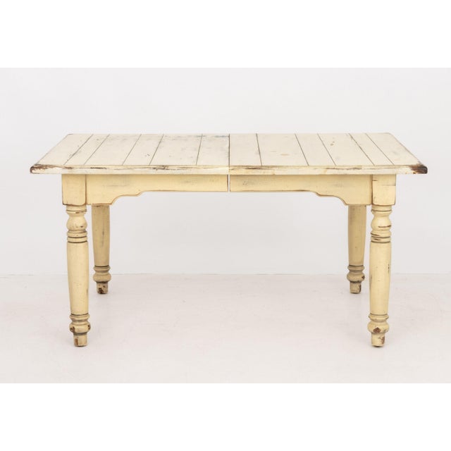 Provincial Distressed White Painted Pine Dining Table, with one central leaf on four turned wood legs. Extended: 29.75" H...