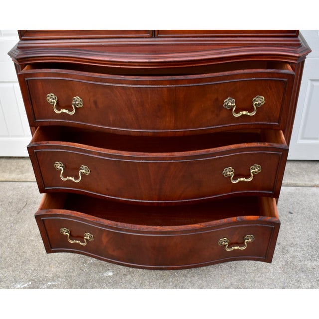 Vintage (1950's) China Cabinet/Hutch has a Chippendale Style. The Wood is Mahogany. Serpentine Swan Neck, Two Doors with...