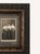 A striking antique carved wood frame housing an original sepia studio photograph, beautifully preserved and rich with late...