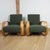 A pair of 'tank chairs 400' by alvar aalto. Beech bentwood with forest green boucle re-upholstery. Designed 1936....