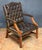 A fine Gainsborough library armchair or lounge chair upholstered in patinated leather from England - featuring a high...