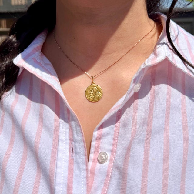 About This Pendant: This cherished Italian religious medallion captures Saint Anthony of Padua Baby Jesus. Handcrafted in...
