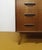 Vintage Danish teak chest of drawers from the 1950s with six drawers and integrated handles, featuring an elegant vertical...