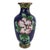 This vintage Chinese cloisonné vase is a stunning decorative piece. It features intricate lotus and vine floral designs in...