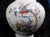 This is a medium size Thomas vase in the Paradies pattern from the 1930s. The vase is off white or cream with a multicolor...