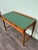 A desk with two beech wood drawers and a green Formica top. Made in Italy in the 1960s, imitating the Danish model...