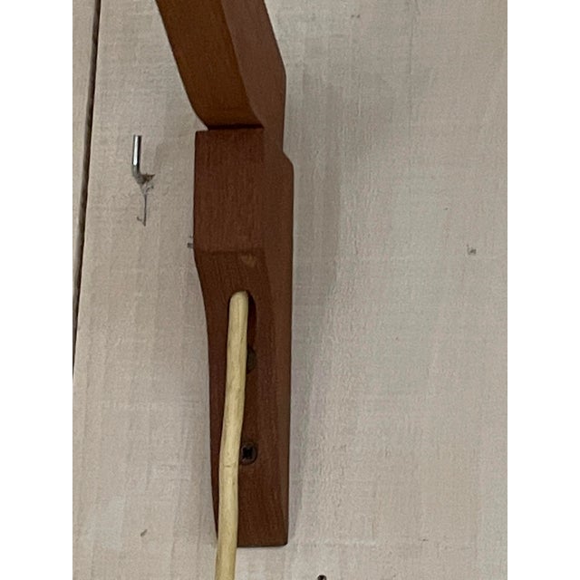 A splendid and rare example of a swing-arm wall lamp from the 1960s, a perfect example of transatlantic Midcentury Modern...
