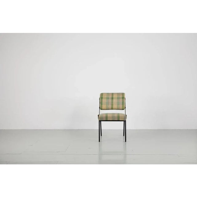 This Italian dining chair was made by Arflex in 1955. The model was designed for the interior of an Italian cruise ship....