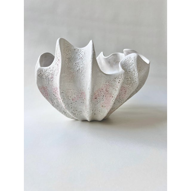 This unique sculpture/coral bowl is created from stoneware clay. This piece is hand-built and hand-painted. it is made to...