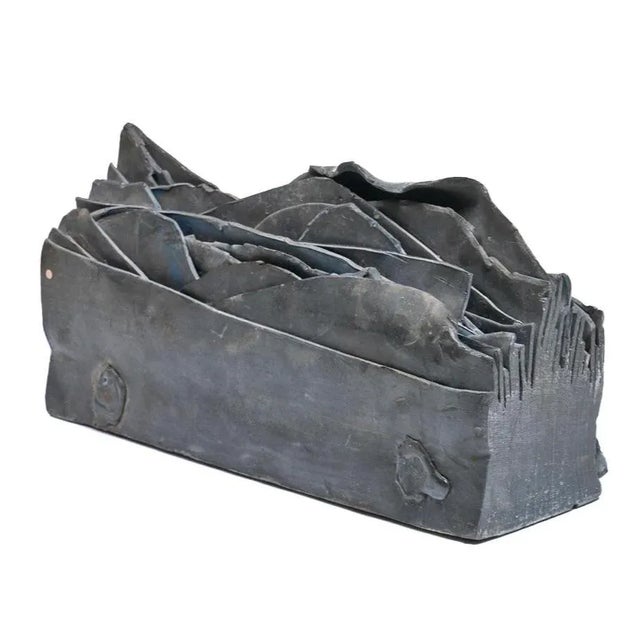 Very heavy vintage layered metal abstract sculpture. Unsigned.