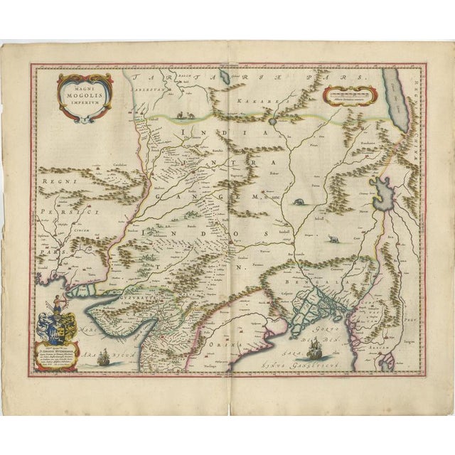 A richly detailed and highly decorative map of the Mughal Empire, centered on northern India and extending from Persia to...