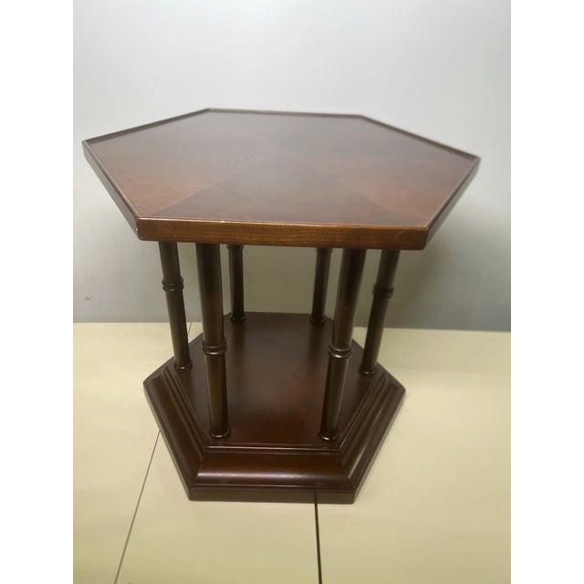 Add timeless vintage character to your home with this charming Maryland Classic hexagon end side table. Featuring a...