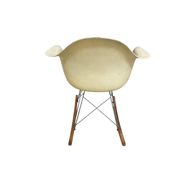Original and authentic fiberglass shell rocking chair designed by Charles & Ray Eames for Herman Miller, C. 1950s...