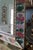 1960s Italian Reverse-Painted Geranium Glass Giltwood Mirror For Sale - Image 4 of 18