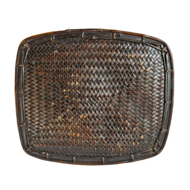 Vintage Akha hill tribe basket from Northern Thailand. Beautiful handwoven bamboo storage vessel featuring a softly...