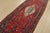 An authentic vintage tribal Malayer runner hand-knotted with fine wool and natural dyes. This oriental rug features a...