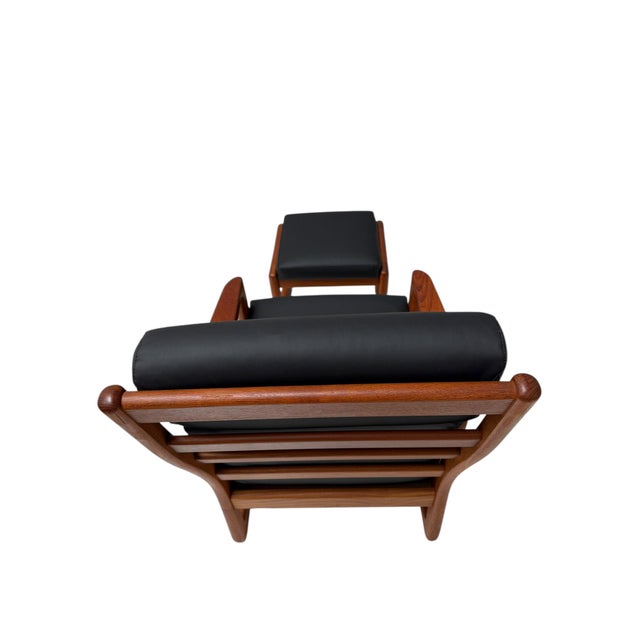 Stunning and elegant pair of Mid-Century Modern lounge chairs with matching hocker. Design by Johannes Andersen for CFC...
