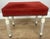 A stylish Vintage French footstool , featuring a rich red upholstered seat that adds warmth and elegance to any setting....