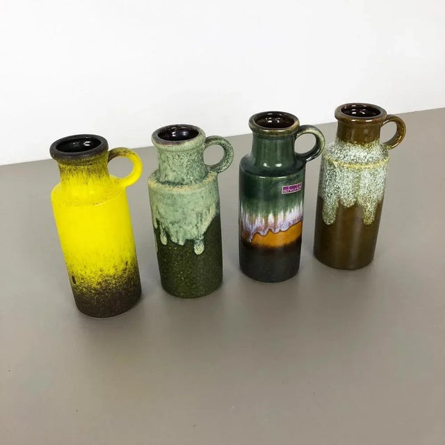 Article: Set of four fat lava art vases Producer: Scheurich, Germany Design: Nr. 401-20 Decade: 1970s This original...