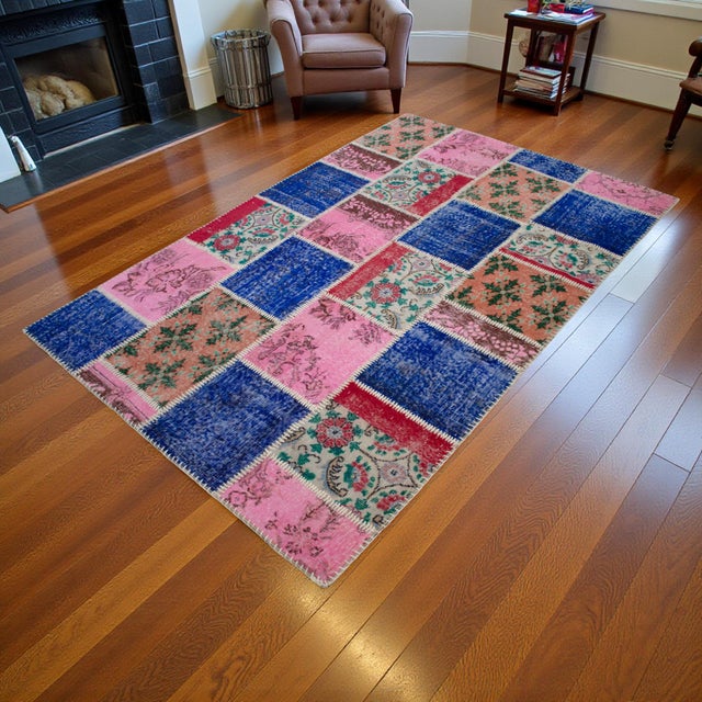 This masterfully curated patchwork rug is a contemporary exploration of Anatolian history, artfully constructed from...