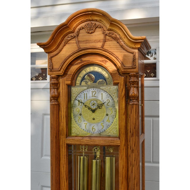 Traditional Howard Miller Oak Grandfather Clock Moon Dial Triple Chime Floor Tall Case For Sale - Image 3 of 17