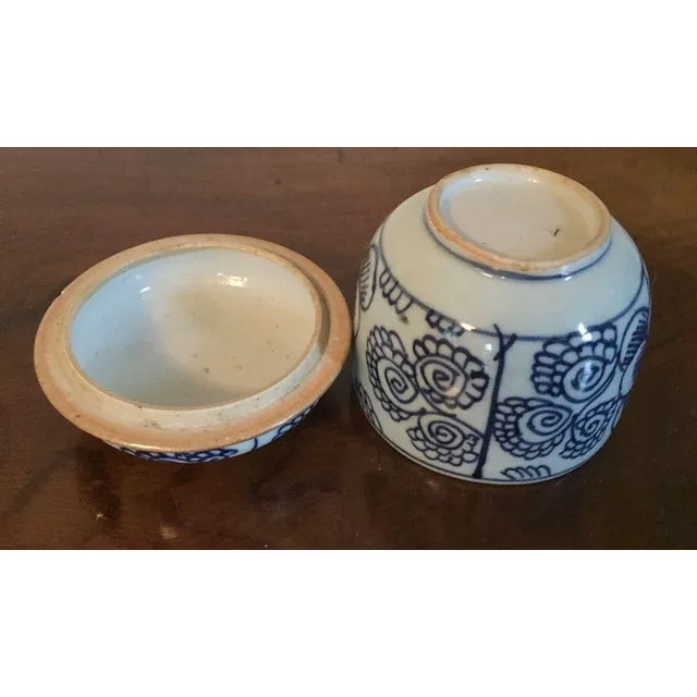 Antique 18th c. Chinese Kangxi blue & white porcelain jar and cover. Decorated with stylized flowers. Measures 4" tall x 3...