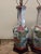 They are in fine condition. No paint loss. No chips or cracks. The both measure as follows. Vase. 22" h Overall. 34" h....