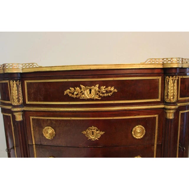 This commode, made by manufacturer Paul Sormani in the 19th century, is made of mahogany and mahogany veneer with gilt...