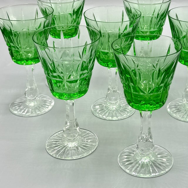 A beautiful set of eight vintage cut crystal wine glasses by Cristalería San Carlos, Argentina, distinguished by their...
