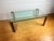 Modernist Art Deco Style Glass and Brass Coffee Table, 1980s, in Very Good conditions. Designed 1980 to 1989