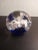 This is a Dynasty Gallery Heirloom 5" Cobalt Blue & White Sunburst Donut Paper Weight. Procured at auction