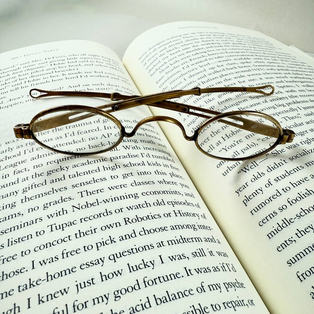 A delicate pair of handmade brass ladies magnifying wire rim eye glasses from the American Civil War era, circa 1860. A...