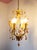 It uses four E14 bulbs. Dimensions: ⌀ 30 cm. It hangs down a total of 78 cm; the minimum height is 54 cm. Up to 250V...