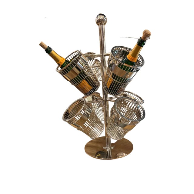 Step into the sleek sophistication of the 1990s with this striking Chrome Wire Basket Champagne Holders on Stand. Designed...